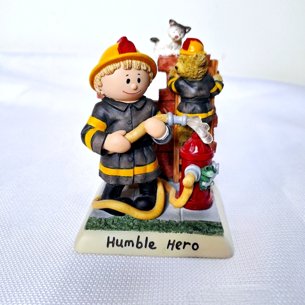 Vtg. Zingle Berry "The Humble Hero" First Responder Firefighter figurine.